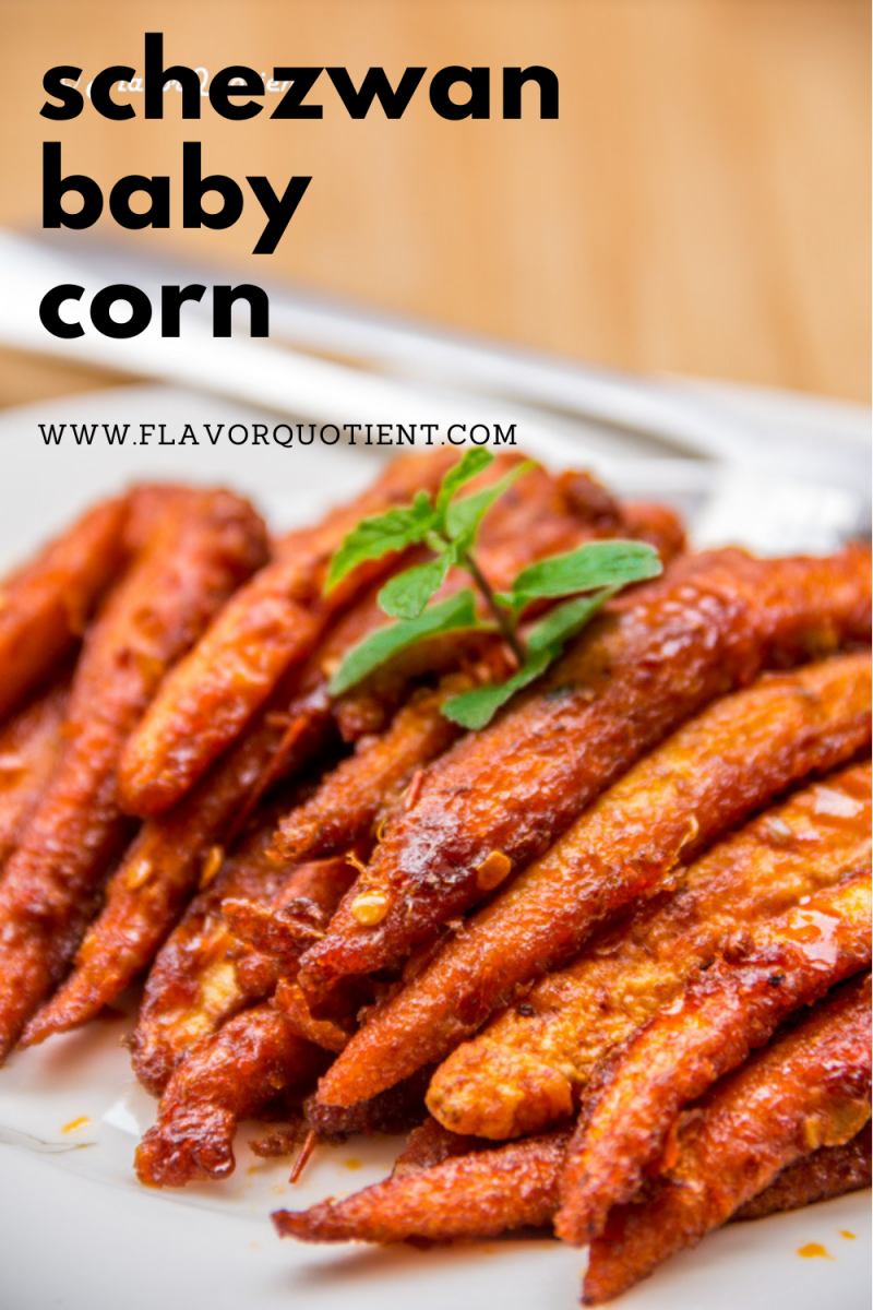 The humble baby corn got its makeover to become super delicious crispy Schezwan baby corn which is ridiculously easy to make! Serve it as an healthy after-school snack or a game-day finger-food and you will rock! Make this crispy baby corn with spicy schezwan sauce as an appetizer to delight all your vegetarian guests in next house party! | crispy baby corn | schezwan baby corn | baby corn recipe | baby corn appetizer | vegetarian appetizer recipe | party snack ideas