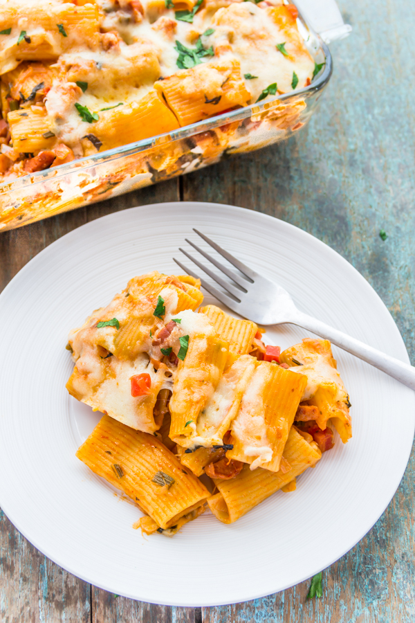 Pizza Pasta Bake | Cheesy Baked Pasta Recipe | This showstopper cheesy baked pasta with chicken sausages and all the goodness of veggies baked to perfection with lots of cheese is a crowd-pleasing cross between pizzas and pastas!
