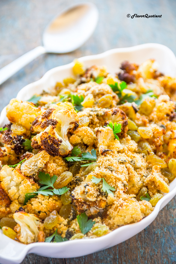 Crispy Roasted Cauliflower with Capers | Flavor Quotient | The crispy roasted cauliflower with capers and raisins is a different take on this trendy veggie which has taken the internet by storm these days! Try this and fall in love with its amazing crispiness all over again!