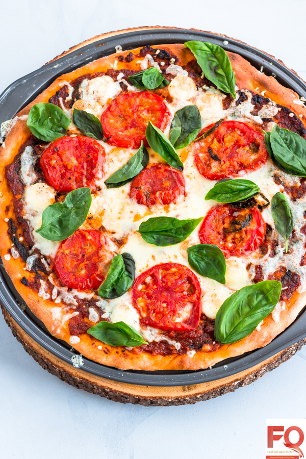 Classic Margherita Pizza from Scratch | Flavor Quotient | A classic Margherita pizza made from scratch at home could be the best thing to reward yourself and your friends & family! This homemade Margherita pizza is the best ever veg pizza I have ever tasted and with my tips & tricks below, you can bake a perfect one at your home too!